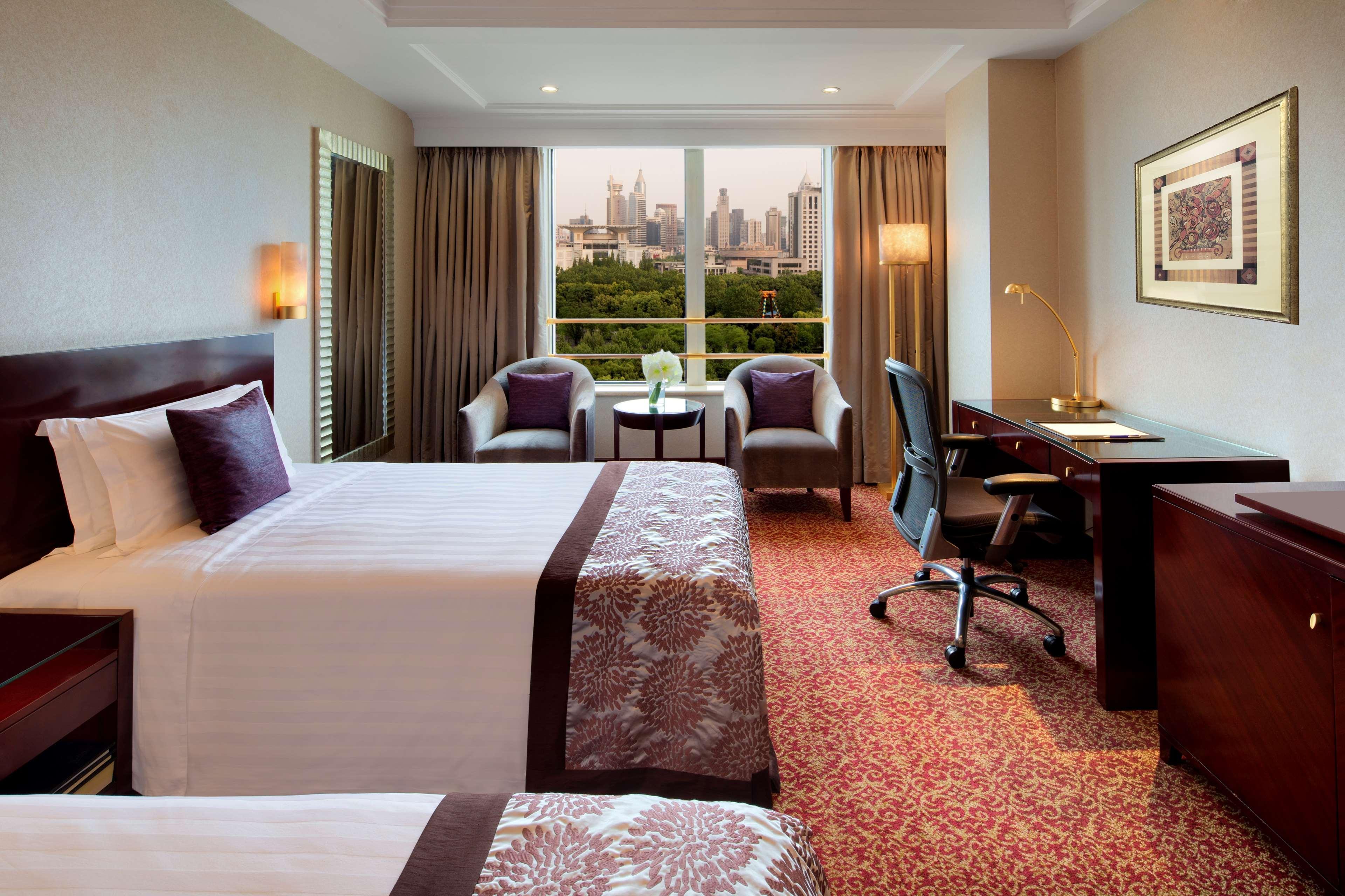 Radisson Blu Hotel Shanghai New World Exterior photo Deluxe Room