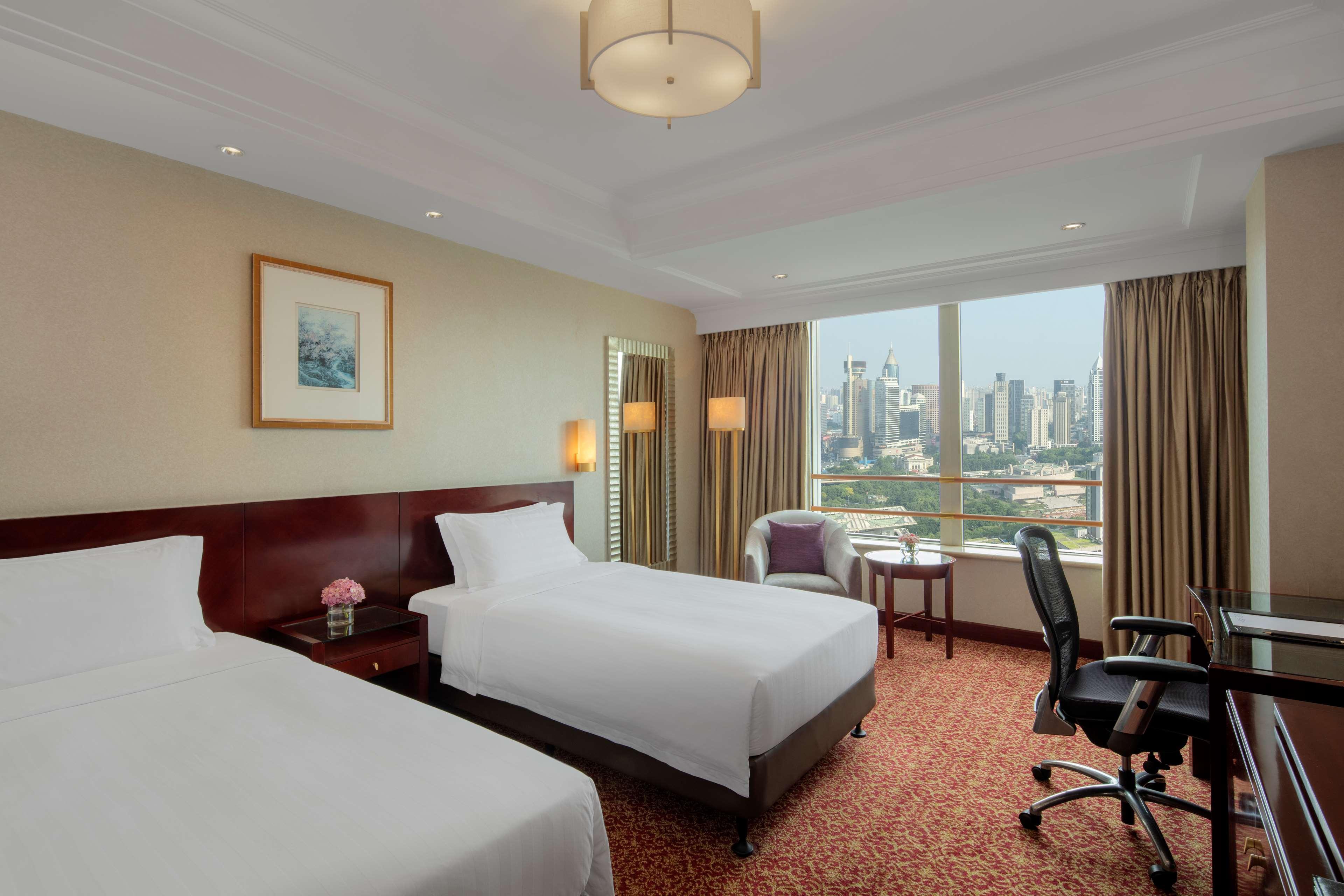 Radisson Blu Hotel Shanghai New World Exterior photo Deluxe Room